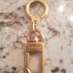 Authentic Louis Vuitton pochette extender/key